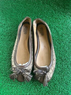 Coach Signature Canvas Ballet Flats in Brown with Tassels